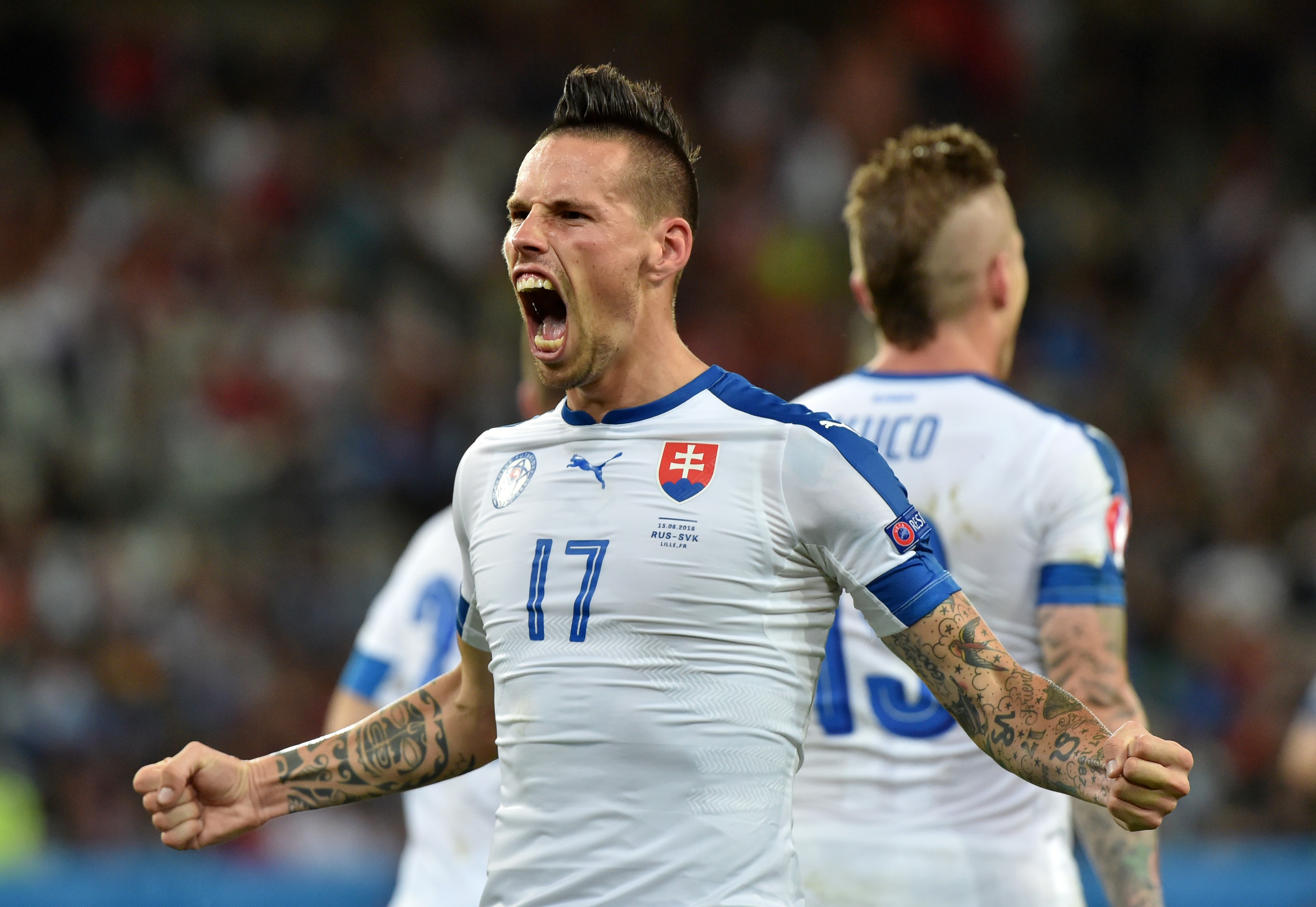 Slovakia's midfielder Marek Hamsik celebrates his goal during the Euro 2016 group B football match between Russia and Slovakia at the Pierre-Mauroy Stadium in Villeneuve-d'Ascq, near Lille, on June 15, 2016