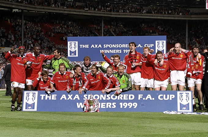 "Манчестер Юнайтед" образца 1999 года, выигравший Лигу чемпионов, чемпионат Англии и Кубок Англии
