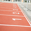 Беговая дорожка номера на стадионе в швейцарском городе Ньон | Фото