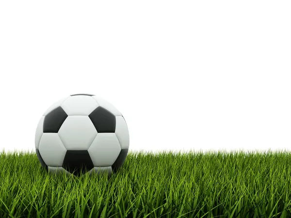 Черный и белый футбол на траве Стоковое Фото