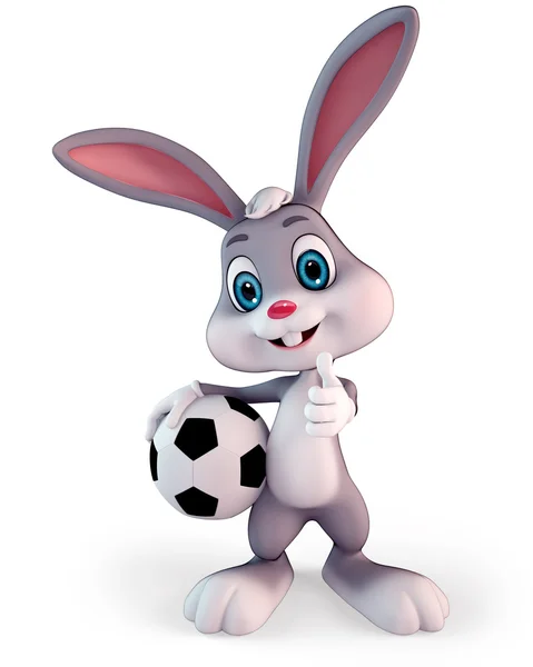 Пасхальный кролик с футболом Лицензионные Стоковые Изображения