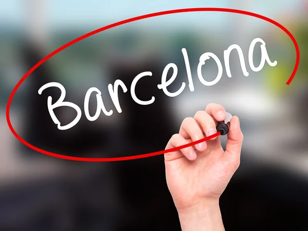 Человек почерков, Барселоны с черным маркером на визуальный экране Лицензионные Стоковые Изображения