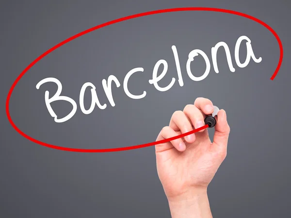 Человек почерков, Барселоны с черным маркером на визуальный экране Стоковое Фото