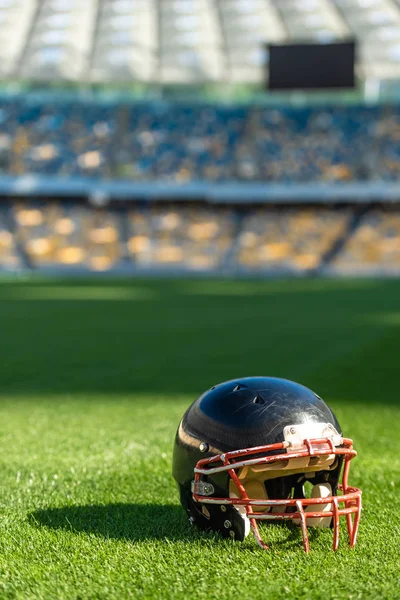 Close Shot American Football Helmet Lying Grass Stadium Стоковое Фото